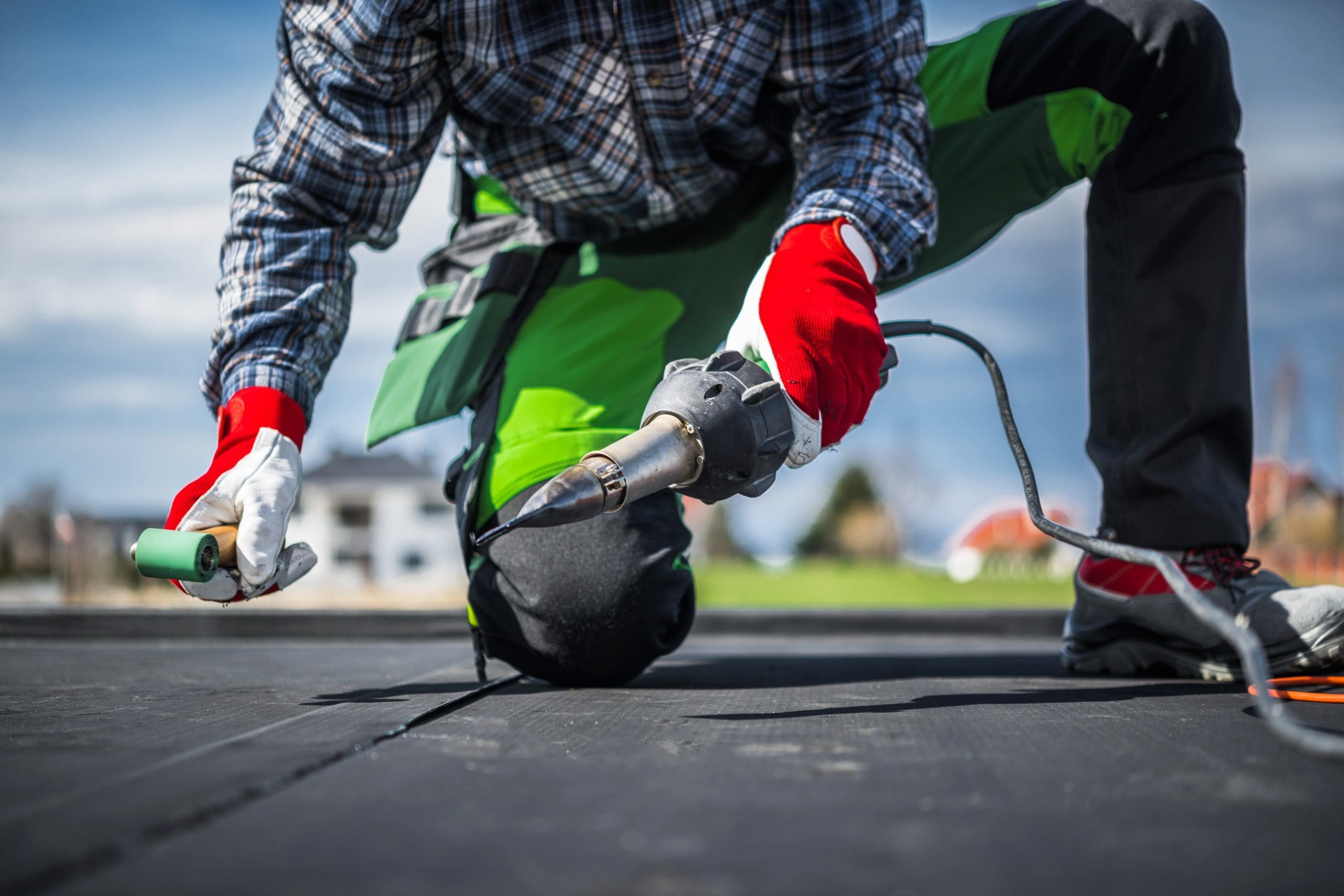 a roofer making repairs